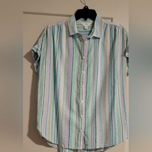 Women's short sleeve button-up blouse.